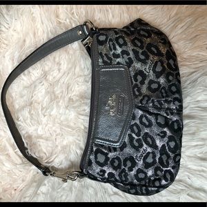 Silver and black Coach purse